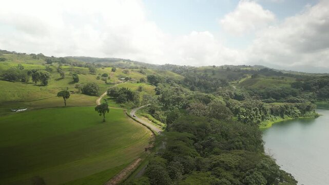 Aerial of Lake Arenal along Route 142 in Costa Rica on sunny day in February