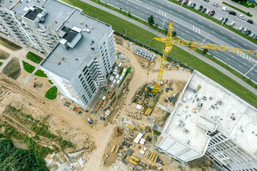 construction of new apartment buildings in a city residential area. aerial drone photo.