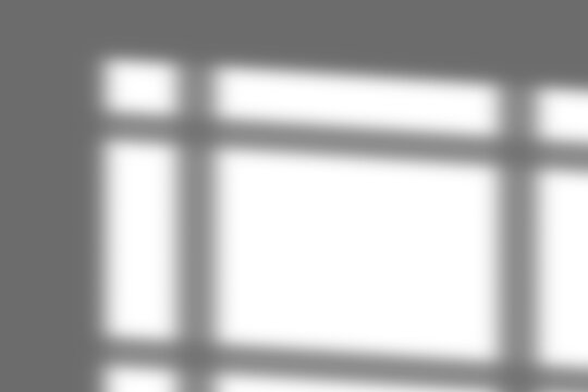 Natural window frame shadow on transparent surface, geometric square pane shade effect