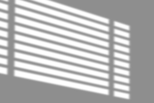 Window blinds shadow overlay. Soft natural abstract silhouette of sunshade, window shadow and light blur abstract background