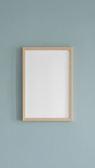 Blank vertical frame on soft pastel blue wall blank frame