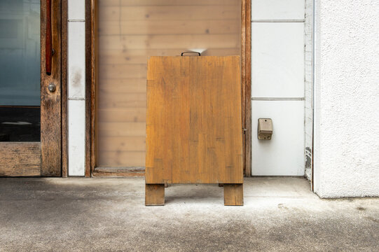 Large blank billboard on a street wall, banners with room to add your own text