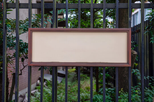 Large blank billboard on a street wall, banners with room to add your own text