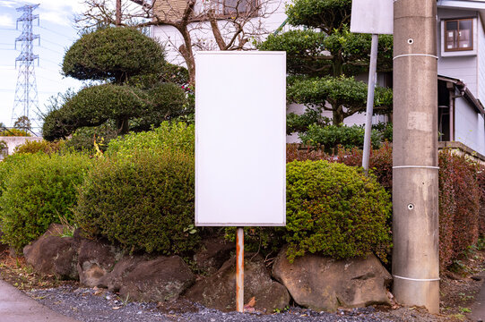Large blank billboard on a street wall, banners with room to add your own text