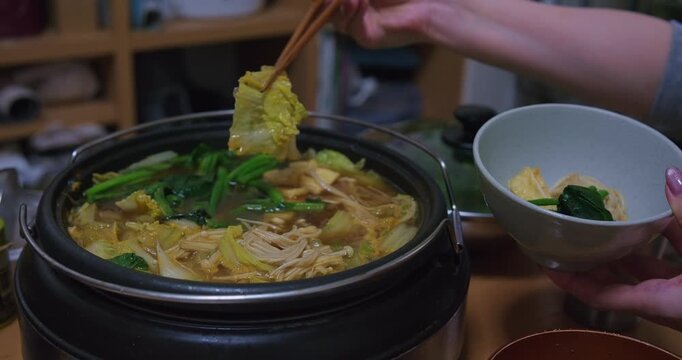 Japanese Nabe Hot Pot Closeup in Cozy Home Interior