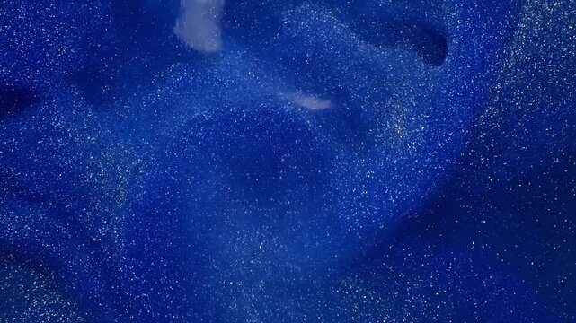 Fluid Dynamics glow glitter with caustic patterns ? gentle motion; royalty-free look; no banners or text; no faces; no trademarks scene 2 Abstract cinematic angle