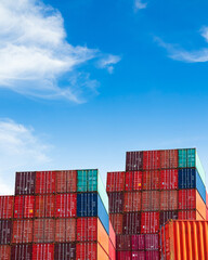 Fototapeta premium Cargo ship container goods export import international transport on blue sky background, warehouse industry business logistics transportation harbor port industrial shipping terminal cargo ship.
