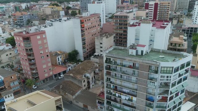 Aerial panning shot over Spanish apartment blocks
