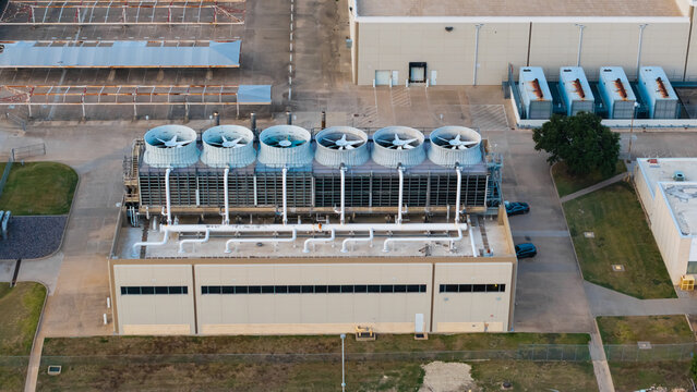 Industrial data center cooling tower system, power generators on building rooftop