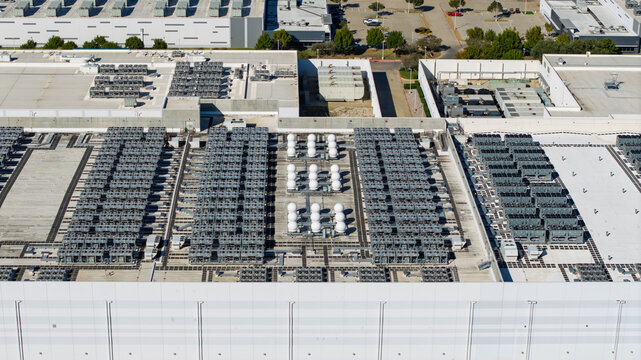Data center roof infrastructure with cooling units aerial view