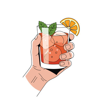Hand holding a refreshing cocktail glass.