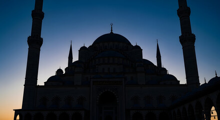Fototapeta premium Mosque Silhouette at Sunset with Minarets