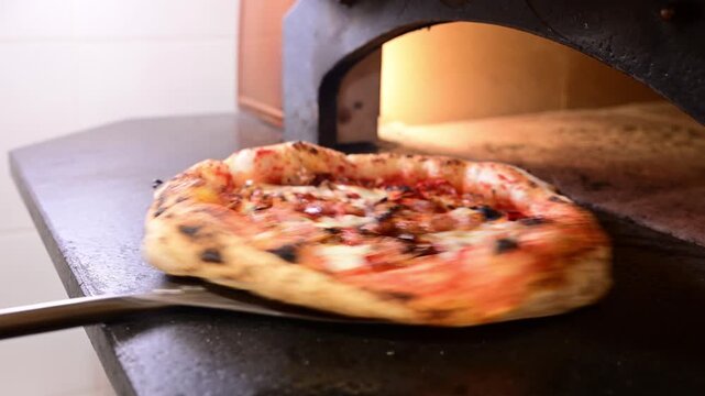 Delicious italian pizza baking in a hot oven