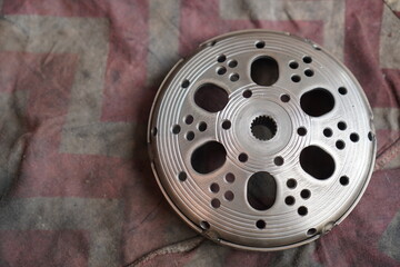 Motorcycle Mechanic Repairing Automatic Scooter Parts. Photos showing a motorcycle mechanic...