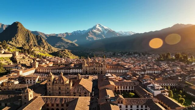 Aerial view of Cusco Peru city center with mountains and a stunning clear sky on a bright sunny day