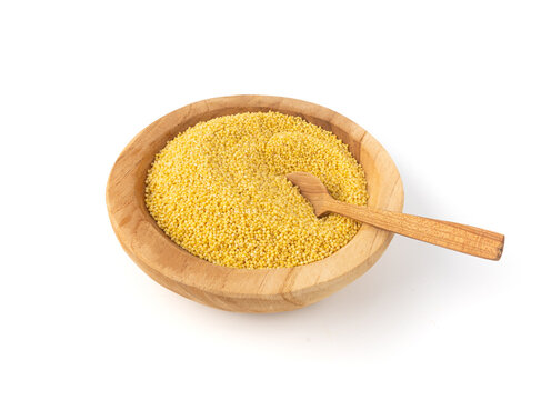 Raw millet grains pile isolated. Little yellow cereal, natural foxtail small seeds