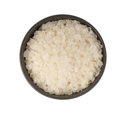 Raw flattened rice isolated. Dry rice flakes or poha, Indian breakfast food