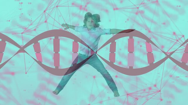Boy initiating star jumps in turquoise studio, DNA helix overlay crossing midline for tech demo