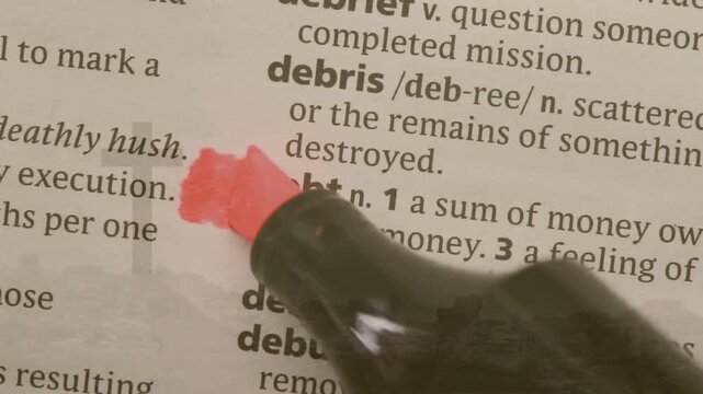 Pink chisel-tip marker approaching then touching paper, sweeping pink band to highlight debt entry