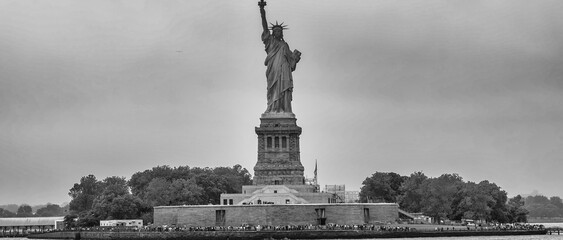 Statue of Liberty shrouded in fog seen from the ferry New York City © jovannig