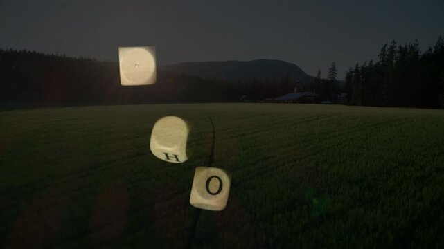 Sunrise-triggered lettered cubes tumbling, rotating and descending field, settling to spell WHO