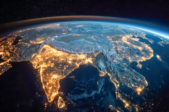Satellite view of the Indian subcontinent and surrounding regions illuminated by city lights at night showcasing geographical features and urban density from space