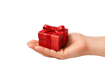 Hand holding small red gift box with ribbon on white background