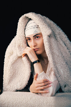 Portrait of a bald young woman with natural beauty and confident expression, isolated on neutral background. Concept of individuality, strength, self-acceptance, awareness, alopecia,