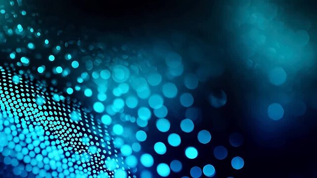 Blue bokeh light dots on dark background