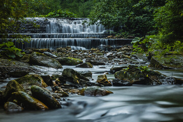 waterfall in the forest © Pawe