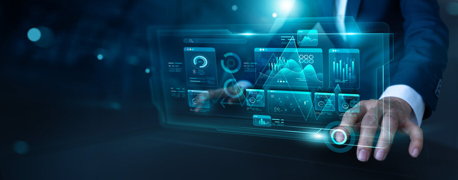 Analyst uses modern digital dashboard for data business analysis insightful analytics of growth and data management system metrics connected to the data network for Finance, Marketing and customer.