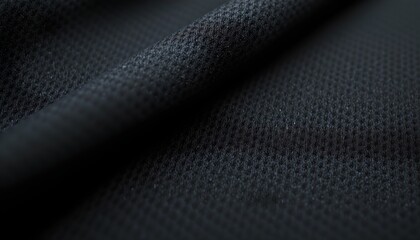 A close up of fabric with a textured pattern that could be mistaken for tiny fish swimming in rows