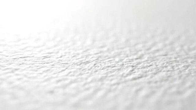 Close-up textured white paper surface with rough fibrous detail
