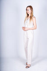 The model is posing for a fashion photo.
