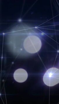 Vertical video: Nodes and bokeh orbs shifting and pulsing on camera pan, showing network activity