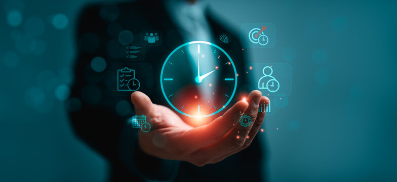 Business professional holding virtual clock interface with productivity and time management icons, deadline planning, scheduling efficiency and performance optimization concept