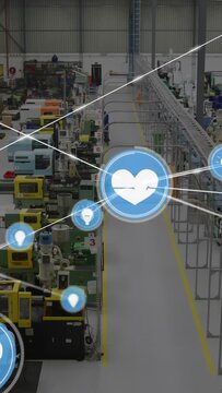 Vertical video: Heart icon popping over aisle, linking nodes to machines, guiding staff in factory