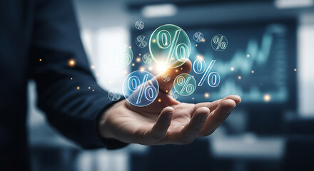 Fototapeta premium A businessman's open palm delicately holds a cluster of glowing percentage icons, which subtly illuminate his hand, symbolizing financial growth, business success, and market analysis.