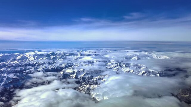 An immersive aerial cockpit POV in a hyperlapse 4K while flying over The Snowed Alps at simulated supersonic speed flight x5 captured from a jet cockpit.