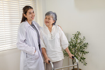 Fototapeta premium Clinic physiotherapy for seniors, doctor assists walking with walker, strength exercise, stability training, fall prevention screening, progress evaluation, rehab follow-up monitoring and support