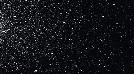 Obraz premium Black background with white specks and particles scattered throughout the space