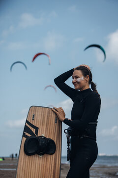 Active Woman Kitesurfing in Summer