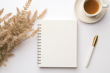 A simple workspace scene in neutral tones with a coffee cup.
