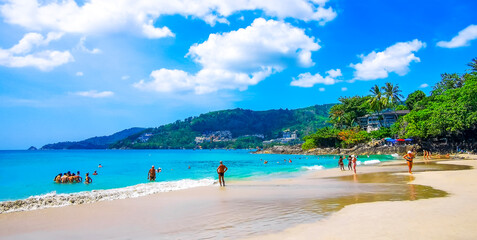 Tropical Patong Kamala Beach Phuket Thailand tourists people parasol palm. © Arkadi