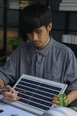 Fototapeta premium Architect Planning a Modern Solar Power House.