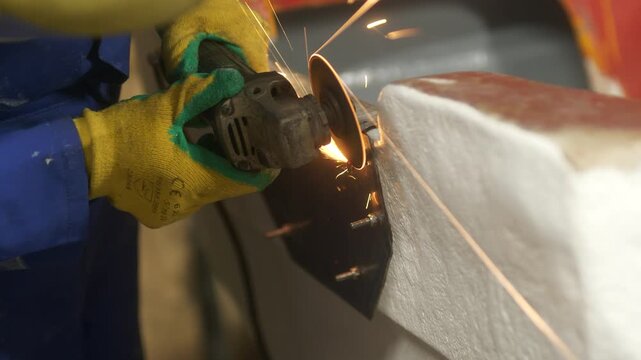 Cutting excess length off stainless steel bolt with angle grinder