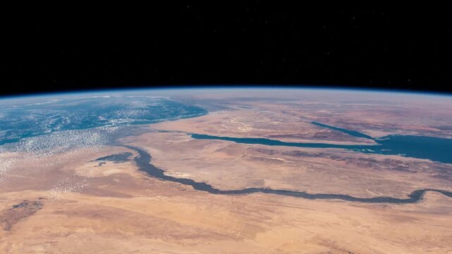 Flying over Nile River and Sinai Peninsula with Earth curved horizon satellite view from space based on Nasa imagery