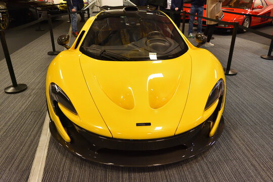 McLaren P1, yellow supercar on exposition. WARSAW, POLAND - JANUARY 14 2023