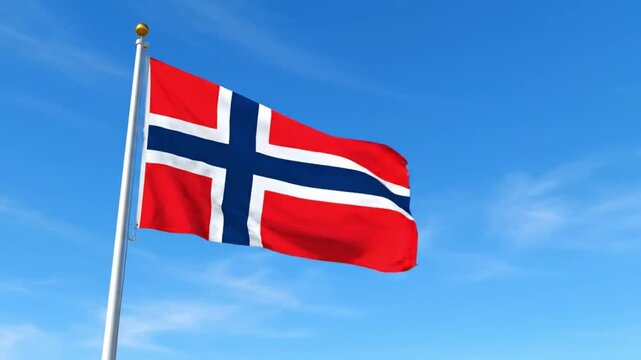 Norwegian flag waving on a pole against a clear blue sky with some clouds