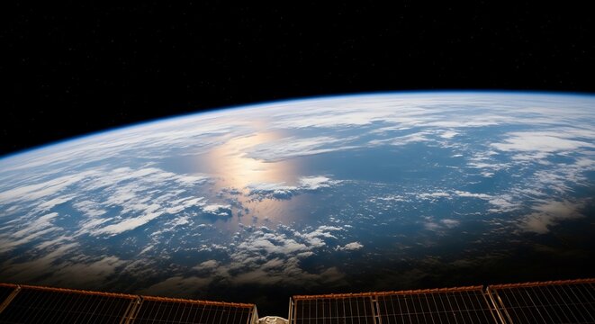 Terrestrial view captures curvature above atmospheric layer against dark outer space backdrop